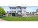 Large, well-maintained backyard with a patio, hot tub, deck and mature landscaping at 7226 Dove Ct, Parker, CO 80134