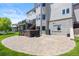 Backyard features a patio, hot tub, and easy access to upper deck with stairs and mature landscaping at 7226 Dove Ct, Parker, CO 80134