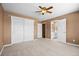 Spacious bedroom boasts an ensuite bathroom and large closet, offering comfort and convenience at 7226 Dove Ct, Parker, CO 80134