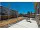 Inviting backyard with a concrete patio and lush yard space, ideal for outdoor activities and relaxation at 6434 N Ensenada Ct, Aurora, CO 80019
