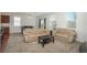 Open living room and dining space featuring comfortable seating at 6434 N Ensenada Ct, Aurora, CO 80019