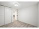 Bedroom features new carpet, large closet, and adjacent hallway at 3070 N Glencoe St, Denver, CO 80207