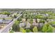 Aerial view of a residential neighborhood with mature trees at 1076 Rosemary St, Denver, CO 80230