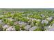 Aerial view of neighborhood showcasing mature trees and well-maintained homes at 1076 Rosemary St, Denver, CO 80230