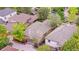 Overhead aerial view of home with a view of the roof, landscaping, and driveway at 1076 Rosemary St, Denver, CO 80230