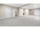 Spacious carpeted basement provides ample storage and living space at 1076 Rosemary St, Denver, CO 80230