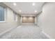 Neutral basement with carpet at 1076 Rosemary St, Denver, CO 80230
