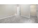 Cozy bedroom with plush carpet and a walk-in closet, offering ample storage at 1076 Rosemary St, Denver, CO 80230