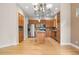 Well-equipped kitchen with stainless steel appliances, granite countertops, and wooden cabinetry at 1076 Rosemary St, Denver, CO 80230
