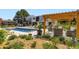 A backyard area includes an in-ground pool, a hot tub, a patio, and lush greenery with a pergola at 6709 Walker Ct, Niwot, CO 80503