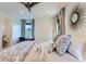This bedroom offers natural light, and features a built-in desk and stylish decor at 6709 Walker Ct, Niwot, CO 80503