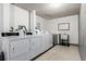Community laundry room with multiple washers and dryers for easy laundry days at 10211 Ura Ln # 8-102, Thornton, CO 80260
