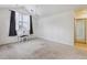 Bedroom featuring ample natural light, a vanity, neutral color scheme, and a large closet at 5885 W Atlantic Pl, Lakewood, CO 80227