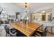 Bright dining area adjacent to kitchen and living room at 5885 W Atlantic Pl, Lakewood, CO 80227