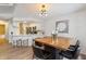 Modern dining area with kitchen access at 5885 W Atlantic Pl, Lakewood, CO 80227