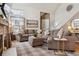 Living room with sectional sofa and fireplace at 5885 W Atlantic Pl, Lakewood, CO 80227