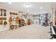 Large finished basement with exercise equipment and musical instruments at 12421 W Fair Dr, Littleton, CO 80127