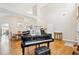 Spacious living room featuring vaulted ceilings and hardwood floors at 12421 W Fair Dr, Littleton, CO 80127