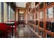 A sophisticated wine room with custom storage, elegant lighting, and a tasting area for an exclusive experience at 2990 E 17Th Ave # 1004, Denver, CO 80206