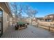 Back deck with picnic table and fall foliage at 11177 W 68Th Pl, Arvada, CO 80004