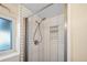 Modern shower with subway tile and glass enclosure at 11177 W 68Th Pl, Arvada, CO 80004