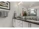 Bright bathroom featuring a double sink vanity with modern fixtures and stylish decor at 3168 W 29Th Ave, Denver, CO 80211
