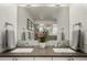 Stylish bathroom featuring double sinks, sleek countertops, and contemporary fixtures at 3168 W 29Th Ave, Denver, CO 80211