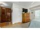 Bright bedroom with a spacious closet, dresser, ceiling fan, and wood flooring at 3168 W 29Th Ave, Denver, CO 80211