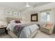 Cozy bedroom with a queen-size bed, soft colors, and natural light from the window at 3168 W 29Th Ave, Denver, CO 80211