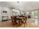 Open dining area with hardwood floors, stainless steel appliances, and access to the backyard at 3168 W 29Th Ave, Denver, CO 80211