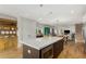 Open kitchen featuring a large island with a microwave and a view to the living room at 3168 W 29Th Ave, Denver, CO 80211