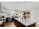Spacious kitchen with a large island, stainless appliances, and a view to the back yard at 3168 W 29Th Ave, Denver, CO 80211