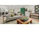 Bright living room features a comfortable seating area, hardwood floors, and natural light at 3168 W 29Th Ave, Denver, CO 80211