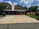 Enjoy outdoor games on the driveway with a temporary court in this beautiful backyard at 22 Rangeview Dr, Wheat Ridge, CO 80215