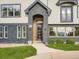 Inviting front entrance with a modern design and well-manicured landscaping at 22 Rangeview Dr, Wheat Ridge, CO 80215
