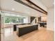 Gourmet kitchen featuring double islands, modern appliances, and a seamless design at 22 Rangeview Dr, Wheat Ridge, CO 80215