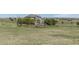 Back of two-story home featuring a staircase, patio area and wooden fence at 2339 Elkhorn St, Parker, CO 80138