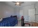 Bedroom with neutral walls, ceiling fan, closet, and comfortable furnishings at 2339 Elkhorn St, Parker, CO 80138