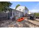 Spacious backyard with stone patio, deck, and ample space for outdoor activities and relaxation at 1024 S Mobile St, Aurora, CO 80017