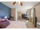 Bedroom featuring bed, desk, and windows that allows for natural light at 1024 S Mobile St, Aurora, CO 80017