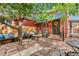 Charming backyard patio with a fire pit and comfortable seating area at 3321 W 29Th Ave, Denver, CO 80211