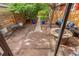 Backyard featuring a stone patio with fire pit, seating, and garden at 3321 W 29Th Ave, Denver, CO 80211