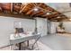 Finished basement with a desk area and updated flooring, great for an office or flex space at 3321 W 29Th Ave, Denver, CO 80211