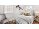 Cozy bedroom with natural light, neutral decor, and hardwood floors, providing a relaxing retreat at 3321 W 29Th Ave, Denver, CO 80211
