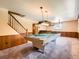 Finished basement with pool table and bar area, perfect for entertaining guests at 4000 S Dahlia St, Cherry Hills Village, CO 80113
