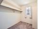 Walk in closet with carpet and window at 4000 S Dahlia St, Cherry Hills Village, CO 80113