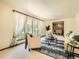 Bright living room with large windows, elegant furnishings, and an open layout at 4000 S Dahlia St, Cherry Hills Village, CO 80113