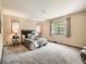 Spacious main bedroom with neutral walls, carpet flooring, and plenty of natural light at 4000 S Dahlia St, Cherry Hills Village, CO 80113