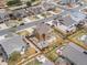 Drone shot displaying the home's fully fenced backyard, patio, and landscaping at 353 Zuniga St, Brighton, CO 80601