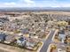 Panoramic aerial view of a residential neighborhood showcasing well-maintained homes and green spaces at 353 Zuniga St, Brighton, CO 80601